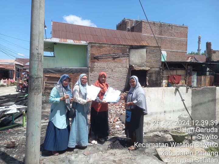 Penyerahan Dokumen Kependudukan kepada Korban Musibah Kebakaran